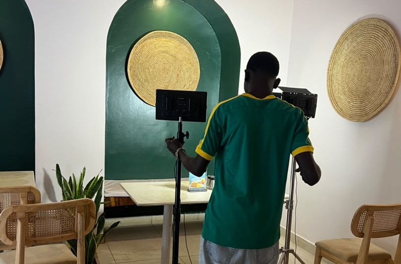 Crew lighting a night studio set